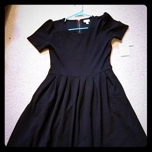 SOLD LuLa Roe Amelia size large SOLID BLACK!! NWT